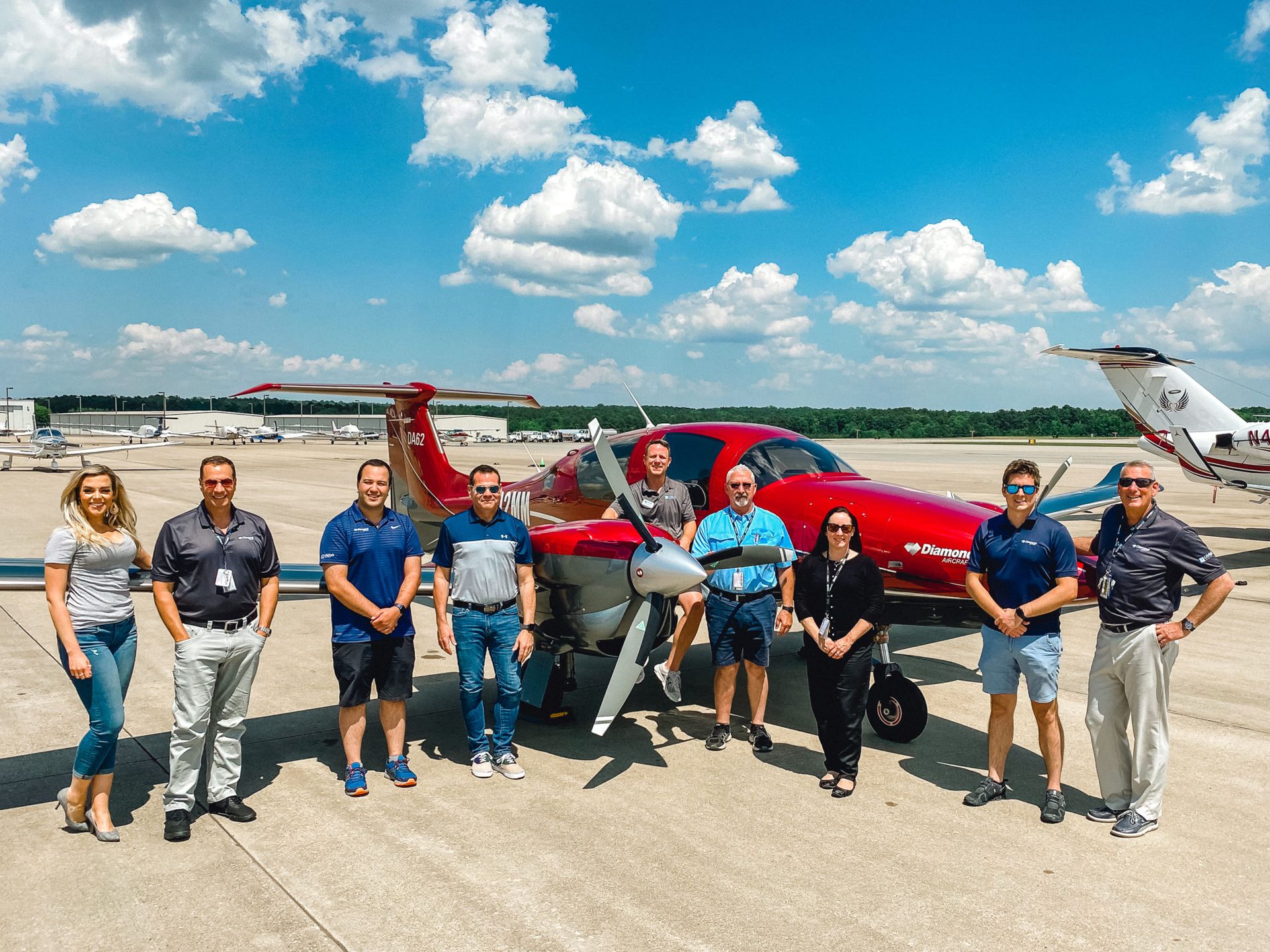 LifeStyle Aviation Team in front of red DA62