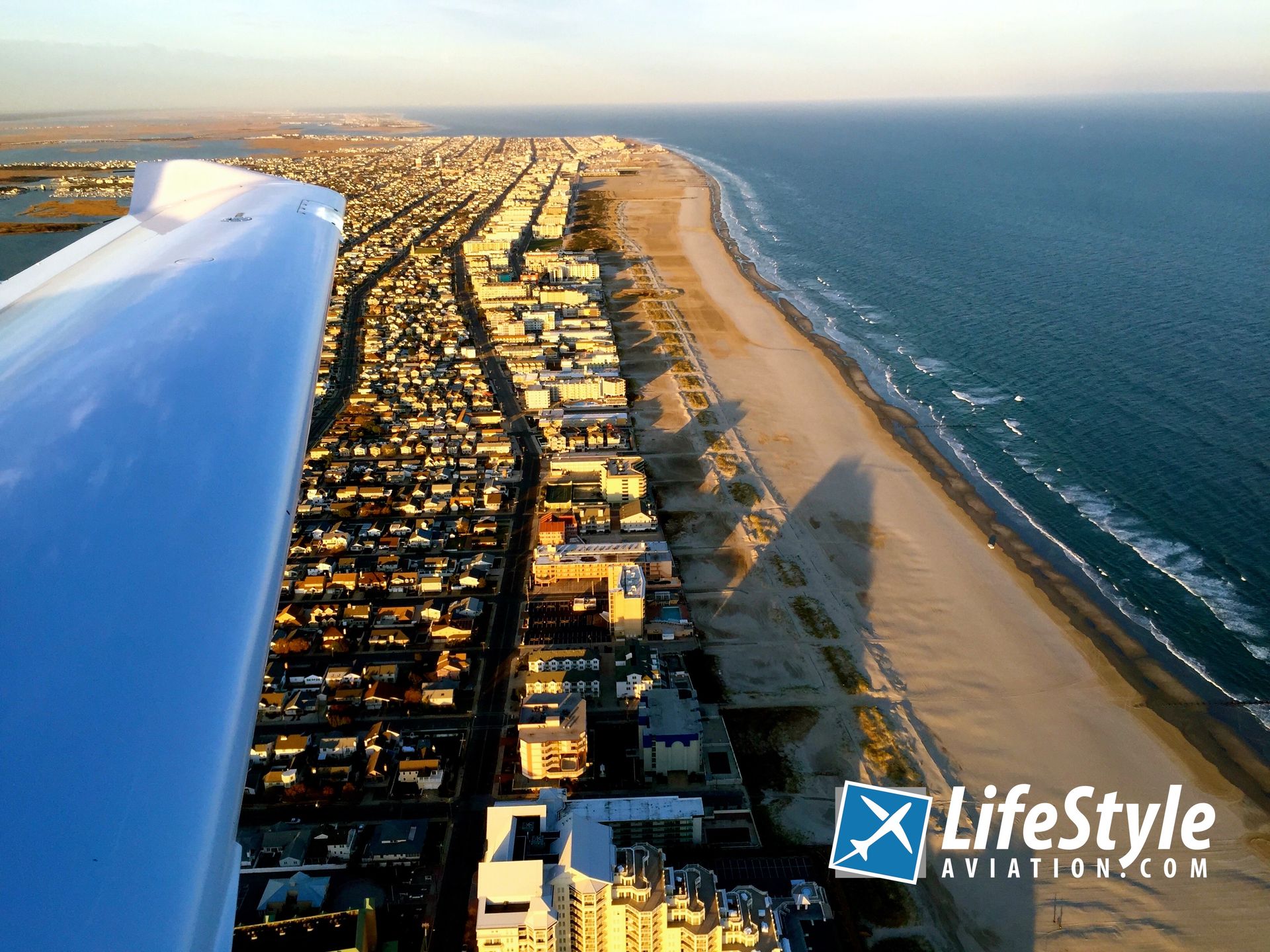 DA40 Flying over Cape May Beach